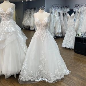 Allure Wedding dress brand new. Never worn.